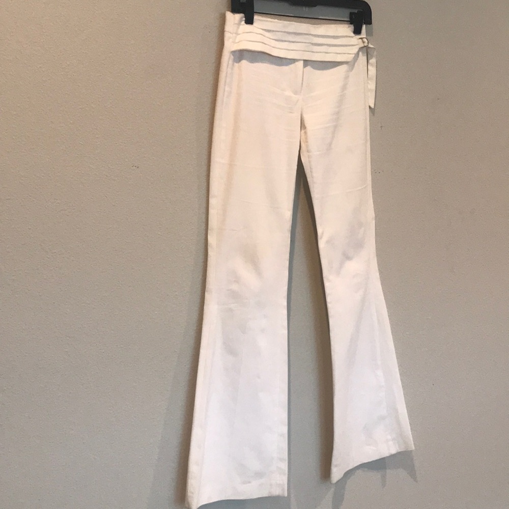 BCBGMaxAzria white flared pants with tuxedo band.